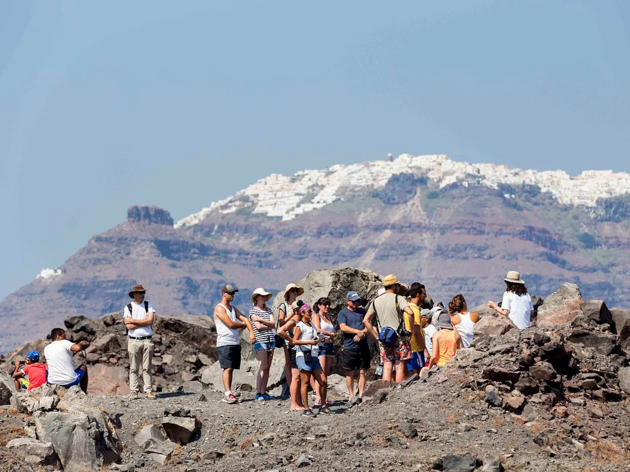 Santorini: Volcanic Sunset Cruise with Dinner